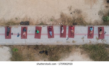 Lucknow ,India 25 May 2020: Due To Extreme Heat Beds Were Laid Outside For Persons At A Quarantine Centre . Ariel Picture Shot At A Primary School Converted To Quarantine Centre Near The City