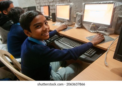 Lucknow, Uttar Pradesh, India-Feb 6 2012: Government School  Students Learning Computer Programming In Lucknow