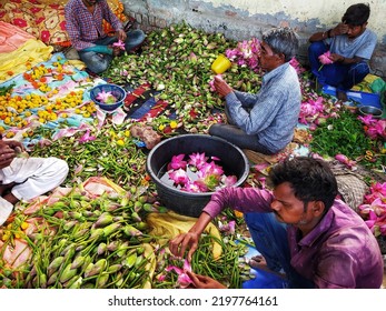 Lucknow Uttarpradesh 24 May 2022 India: Indian Flower Garland Maker In Local Flower Market Shop In Lucknow India. Asia
