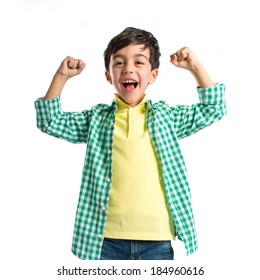 Lucky Brunette Kid Over Isolated White Background 