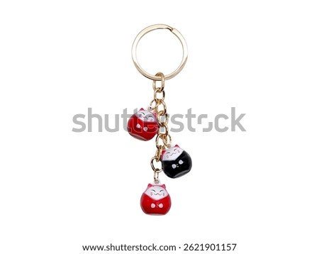 Lucky Charm, Keychain adorned with a trio of delightful daruma doll figures, gold chain, and a split ring