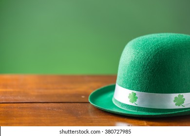 Lucky Green Hat For St. Patricks Day On Rustic Wood Background