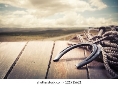 Lucky horseshoe on a porch - Shutterstock ID 121915621