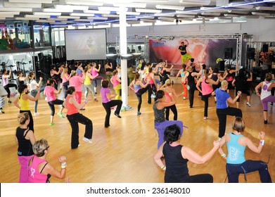 Lugano, Switzerland - 10 november 2013: People dancing during Zumba training fitness at a gym of Lugano on Switzerland