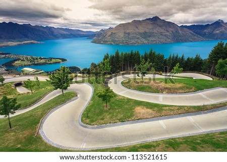Luge track with beautiful lake and mountain at Skyline, Queenstown, New Zealand
