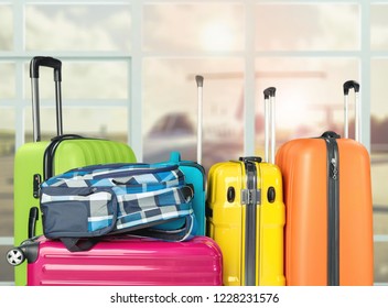 Luggage bags on background, travel concept - Shutterstock ID 1228231576