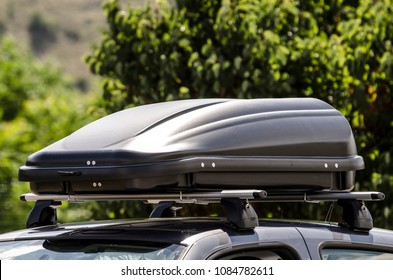 Luggage Box Mounted On The Roof Of A Car 