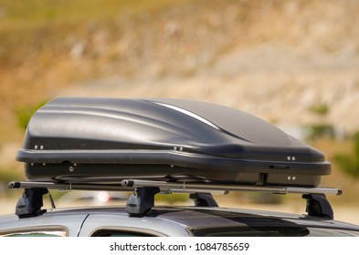 Luggage Box Mounted On The Roof Of A Car 