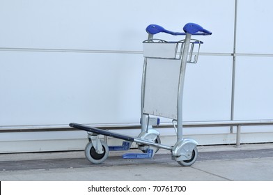 Luggage Cart At Modern Airport.