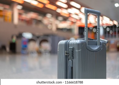 luggage holder on suitcase or bag with TRAVEL INSURANCE ,traveling luggages in an airport terminal,before passenger  and plane flying over sky,Can be used for montage or display your products - Shutterstock ID 1166618788