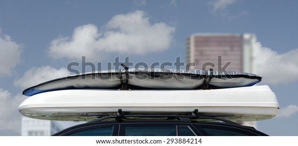 Luggage on car roof rack\
for vacations