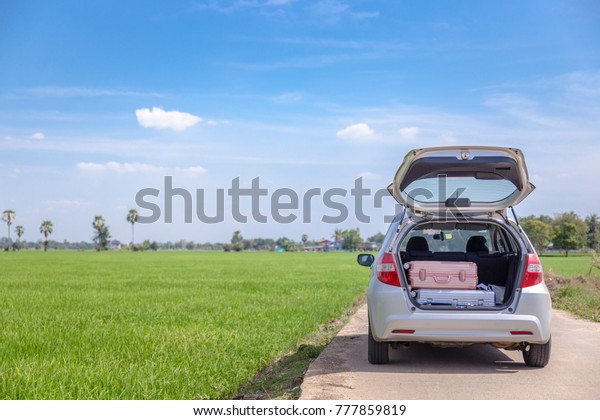 Luggage on the car is\
traveling.