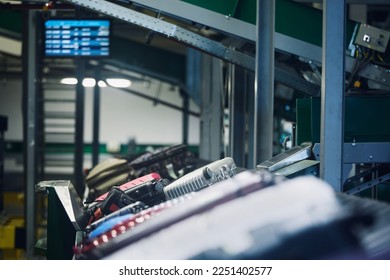 Lot of luggage on conveyor belt. Baggage sorting at airport. Traveling by airplane.  - Shutterstock ID 2251402577
