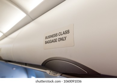 Luggage Shelf In The Aircraft Business Class. Luxury Interior In The Modern Business Jet