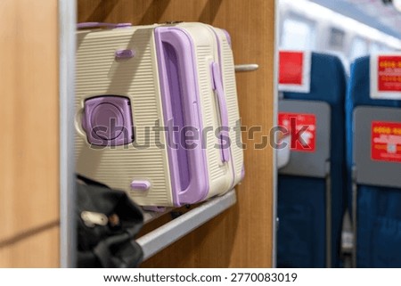 Luggage in Train Storage Compartment