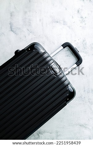 Luggage,black suitcase set on a white background top view image flat laying element Minimal travel concept. black and dark classic luggage prototype both small and large luggage accessory set travel 
