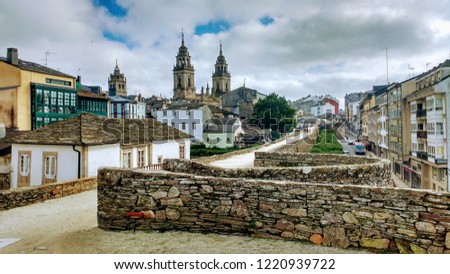  Lugo city, Galicia, Spain. Roman walls of Lugo town, listed as World Heritage by UNESCO and Cathedral