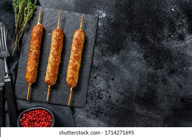 Lula Kebab. Shish Kebab On A Stick, From Ground Beef Meat. Black Background. Top View. Copy Space