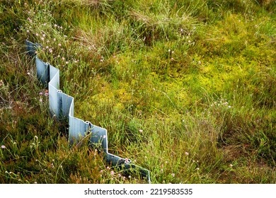 Lullymore, Co. Kildare, Ireland, 07-11-2019. Drain Blocking Using Plastic Panels To Restore Peatland Health Has Been Successfully Applied To The Bog Of Allen.