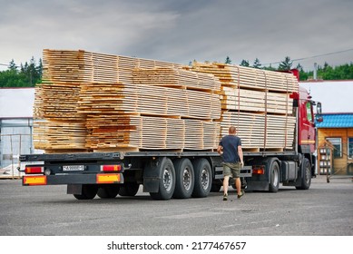 Lumber Delivery Truck. Truck Charged With Wood Boards. Wood Planks Transportation, Lumber Hauling Truck. Wood Industry, Lumber Business. Lumber Production And Delivering
Planks