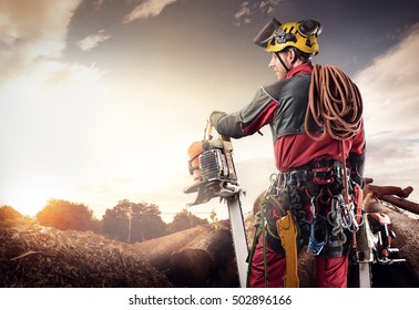 lumberjack with chainsaw isolated over black background - Powered by Shutterstock