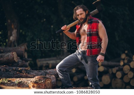 Lumberjack in forest