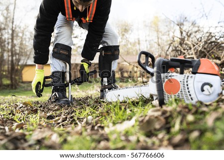 Similar – Arborist with tools in the wind