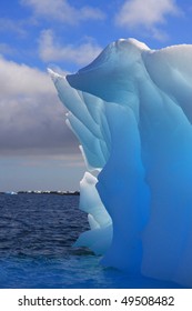 Luminescent iceberg in Antarctica with lovely blue colors.