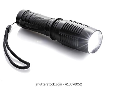 luminous black flashlight isolated on a white background