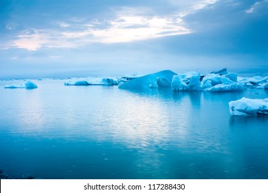 Luminous Blue Icebergs Floating In Jokulsarlon Glacial Lagoon, Iceland