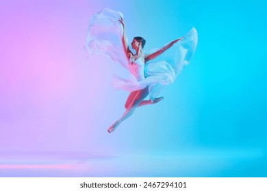 Luminous leap. Ballet dancer in white tutu jumping while dancing in motion in neon light against vivid gradient background. Concept of art, movement, classical and modern fusion, beauty, fashion. Ad - Powered by Shutterstock