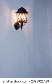 luminous wall street light.Оld style lantern