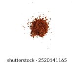 A lump of dried red chili powder. A sprinkling of lumpy spicy granules. Lump of red chili powder. The effect of coating chili or paprika