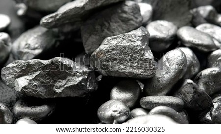 lump of silver or platinum or rare earth mineral on a floor