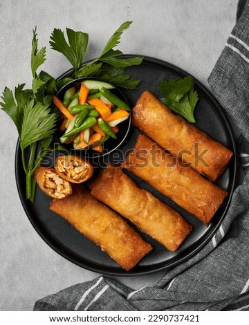 Lumpia are various types of spring rolls commonly found in Indonesia and the Philippines. Lumpia are made of thin paper-like or crepe-like pastry skin called 
