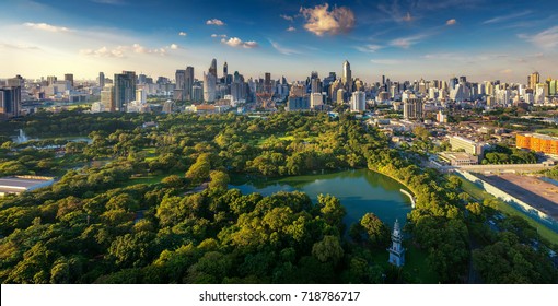 Lumpini park and Bangkok city building view from roof top bar on hotel, Bangkok, Thailand - Shutterstock ID 718786717