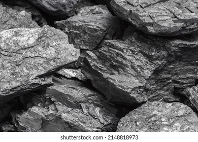 Lumps of black lignite or bituminous coal. Natural source of energy. Mineral stone rock