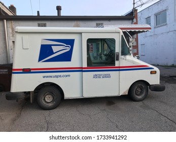 LUNA PIER, MICHIGAN / U.S.A. : MAY 17, 2020 : The Local Mail Delivery Truck Behind Luna Pier's Post Office After Hours.