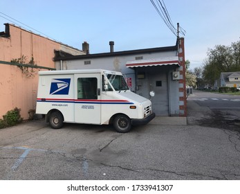 LUNA PIER, MICHIGAN / U.S.A. : MAY 17, 2020 : The Local Mail Delivery Truck Behind Luna Pier's Post Office After Hours.