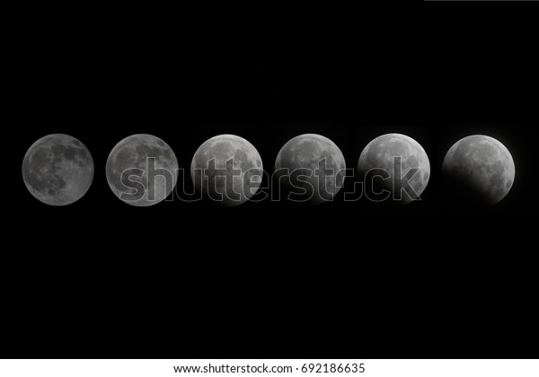 Lunar Eclipse in Asia / The Moon is an\
astronomical body that orbits planet Earth, being Earth\'s only\
permanent natural satellite. It is the fifth-largest natural\
satellite in the Solar\
System