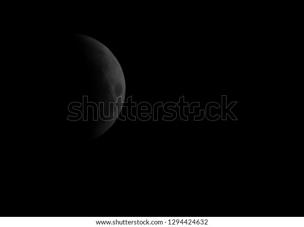 Lunar eclipse just before full\
eclipse, long exposure night photography, lunar eclipse\
2019.