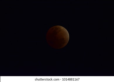 A lunar eclipse occurs when the Moon passes directly behind the Earth into its umbra (shadow). This can occur only when the sun, Earth and moon are aligned (in "syzygy") exactly or very closely.