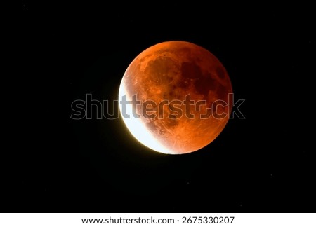 Lunar eclipse on night sky