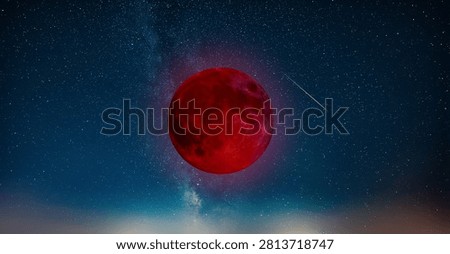 Lunar eclipse on a starry Milky Way background.