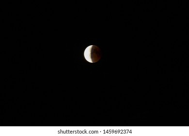 At lunar eclipse, part of the moon darkens into night