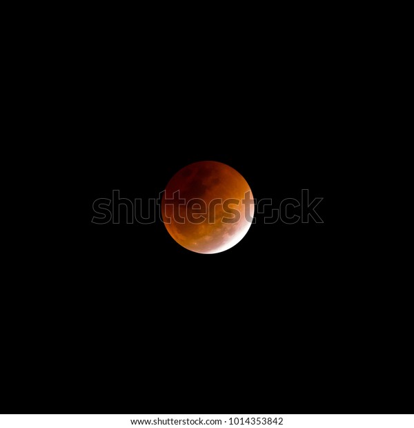Lunar Eclipse (Super Blue Blood Moon). the\
Moon entered shadow of Earth, creating red moon and Lunar Eclipse.\
isolated black\
background.