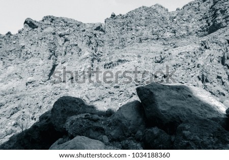 Similar – Beautiful young woman thinking and sitting on the rocks outdoors on the countryside