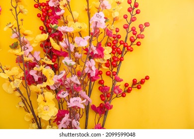 Lunar new year concept, Tet holiday. tet flowers isolated on yellow.Sakura
