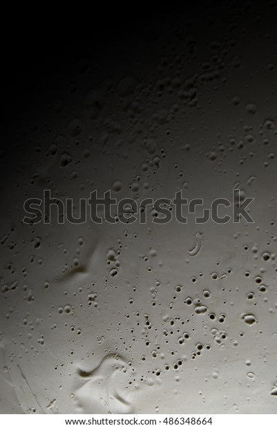 Lunar surface. Lunar craters texture background.\
Plaster fake moon surface