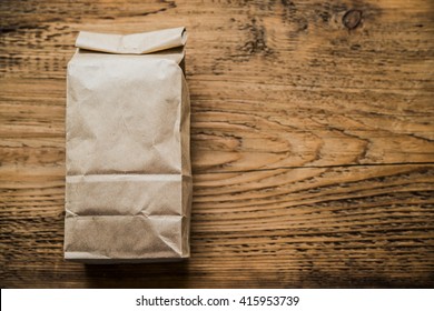 Lunch Bag Isolated On Wooden Texture Background Ot Kitchen Table. 